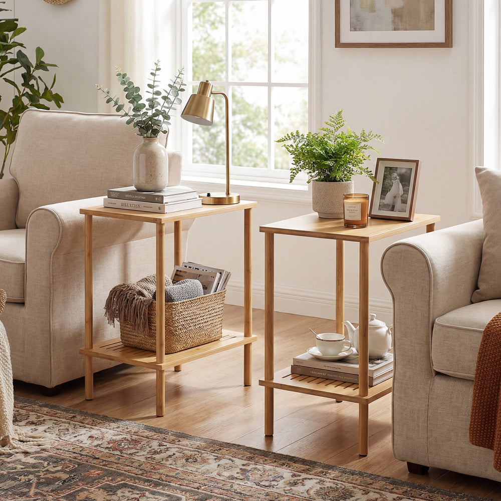 Set of 2 natural bamboo side tables with 2-tier storage shelves, perfect for living room organization and decor.