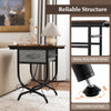 Side table with a carved metal frame and fabric drawer, featuring a rustic wood grain top for living room storage.