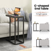 C-shaped side table with heavy-duty metal frame and oak finish, perfect for tight spaces and laptop use.
