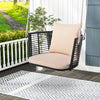 Single person hanging seat with woven rattan backrest, soft cushions, ideal for backyard relaxation.