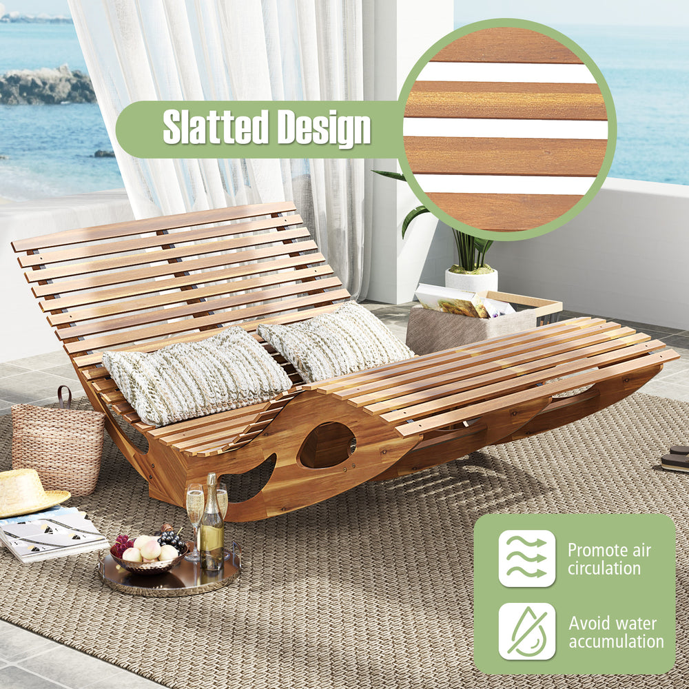 Slatted acacia wood dual rocker sunbed with ergonomic curved seat, ideal for poolside relaxation and air circulation.