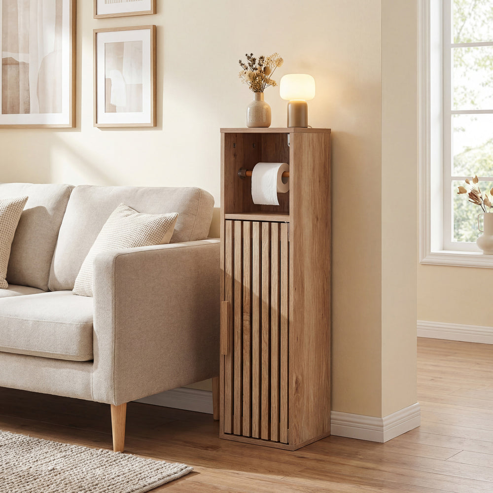 Slim freestanding toilet paper holder stand in natural wood with slat design, ideal for narrow bathroom spaces.