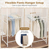 Freestanding garment organizer with 8 hanging rods and detachable pants hangers for efficient clothing storage.