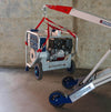 Makinex Powered Hand Truck using sling attachment to lift equipment