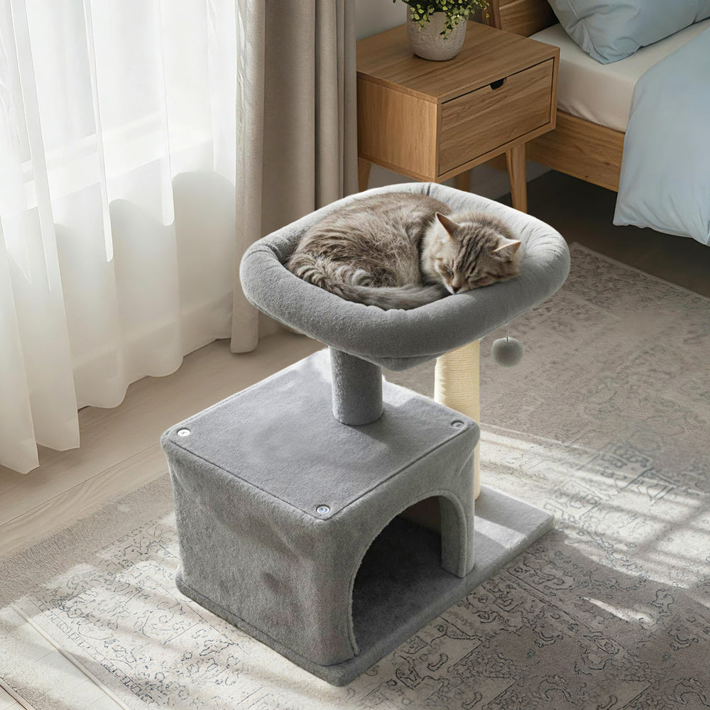 Small cat tree in light gray with a large padded perch and cozy condo, perfect for indoor cats to nap and play.