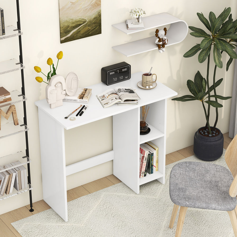 Small white computer desk with adjustable shelf, perfect for space-saving in small apartments and home office use.