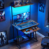 Small computer desk in rustic brown with LED lights, charging station, and wheels, perfect for dorms and apartments.