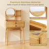 Small vanity desk set made of bamboo with mirror, 2 drawers, and smooth rounded corners for compact spaces.