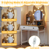 Small vanity desk with mirror and lights in natural finish, featuring 3 lighting modes and ample storage for makeup.