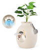 Smart Plant Cat Litter Box in beige with electronic odor removal, featuring a private space for cats and decorative.