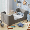 Gray soft velvet toddler bed frame with safety rails and plush upholstery, ideal for children's comfort and safety.