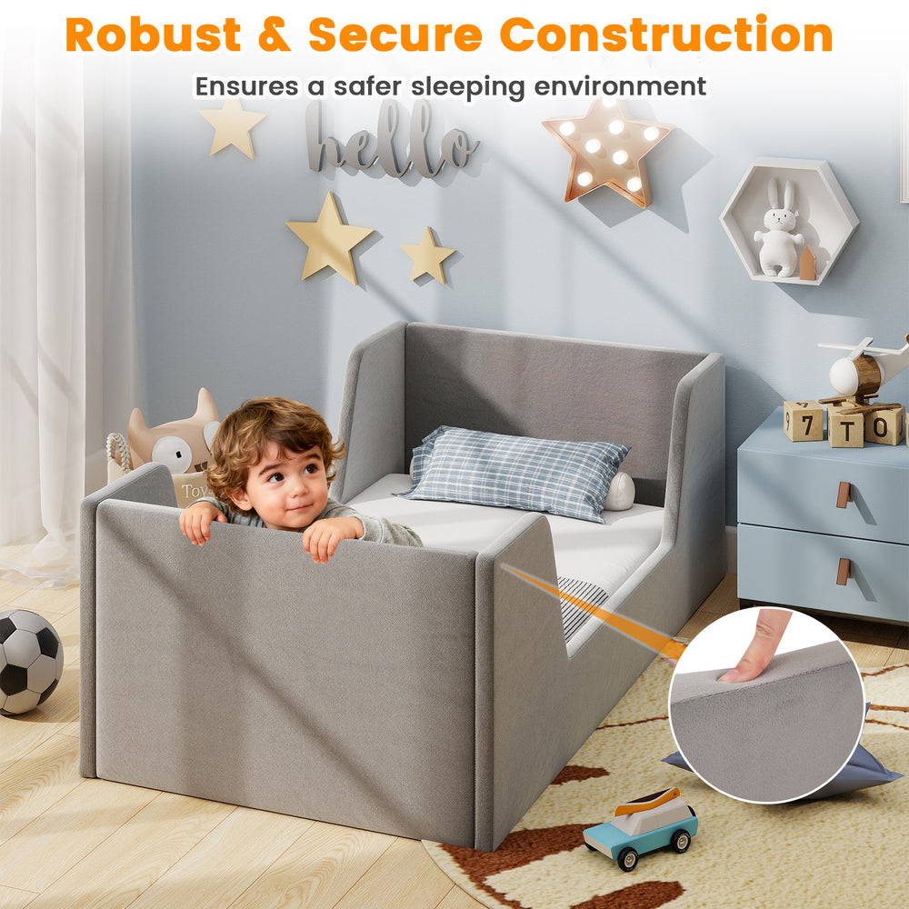 Toddler bed frame in gray soft velvet with safety rails, sturdy wooden slats, ideal for a secure sleeping environment.