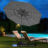 Gray 10 feet solar patio umbrella with 32 LED lights, 3-tier vented top, providing shade by the poolside.