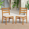 Set of 2 solid acacia wood patio chairs with white padded cushions, perfect for outdoor dining or relaxation.