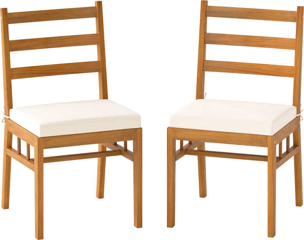 Set of 2 armless patio chairs made of solid acacia wood with white padded cushions, ideal for outdoor dining.