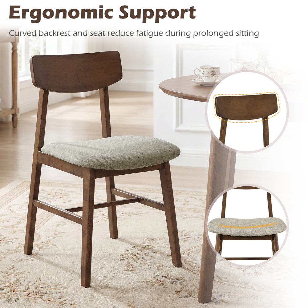 Solid rubber wood dining chair with curved backrest and breathable linen upholstery for ergonomic support and comfort.