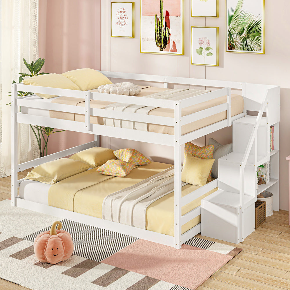 Solid wood full over full low bunk bed in white with storage stairs, ideal for kids' rooms and sleepovers.