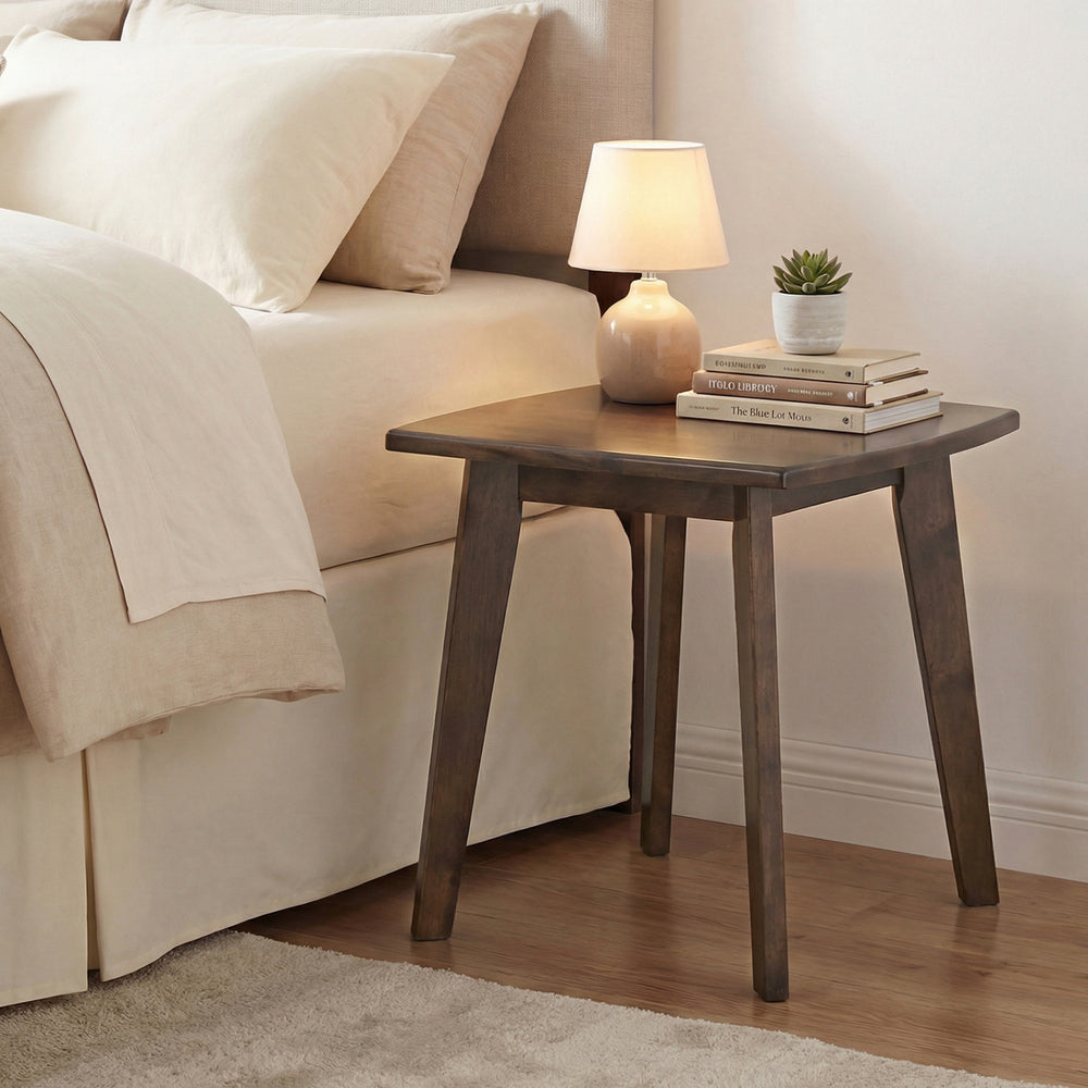 Solid walnut wood side table with thickened top and curved edges, perfect for lamps and snacks beside a bed.