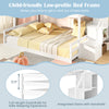Solid wood twin over full low bunk bed in white with integrated stairs and guardrails, ideal for kids' rooms.