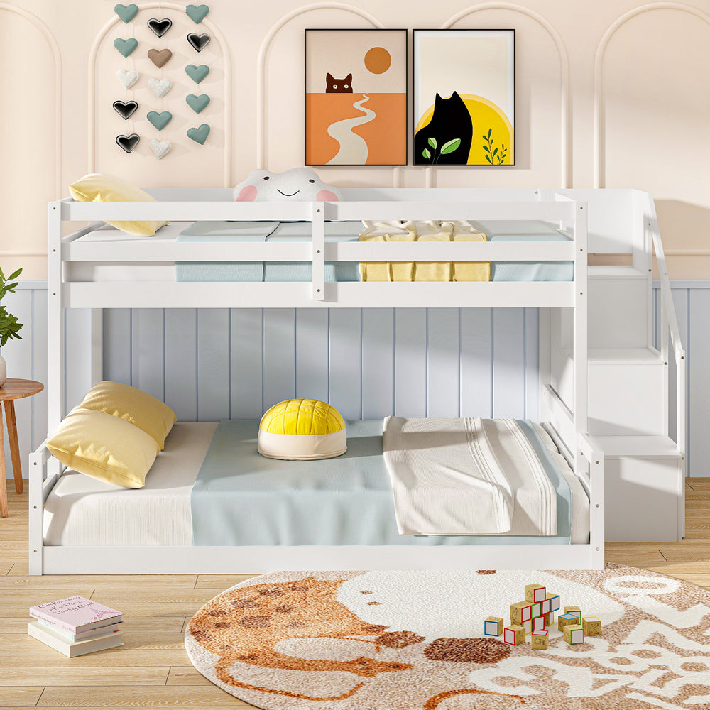 Solid wood twin over full low bunk bed in white with storage stairs, ideal for kids' rooms and safe sleeping.