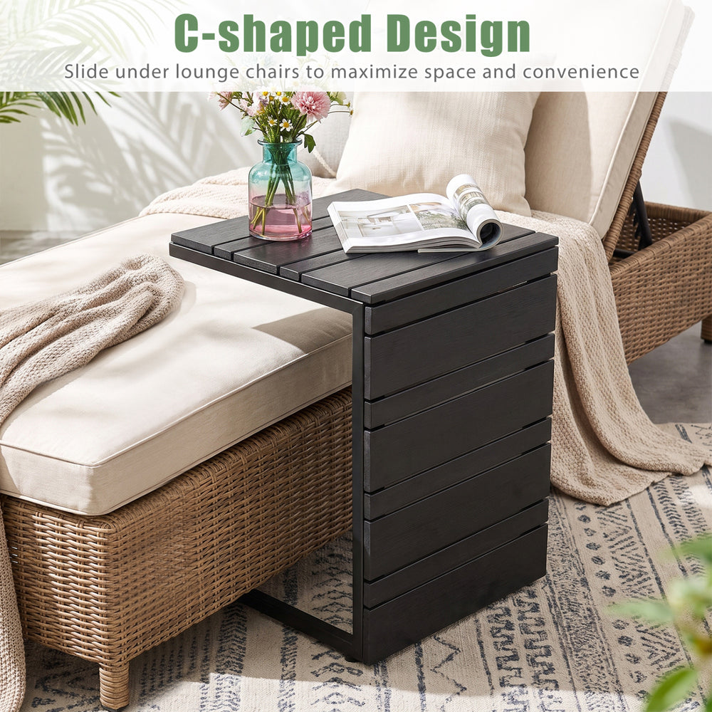 C-shaped side table designed to slide under lounge chairs, featuring a durable wood-plastic top for versatile use.