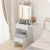 Space-saving white vanity desk with LED-lit mirror, adjustable shelf, and stool for organized bedroom beauty essentials.