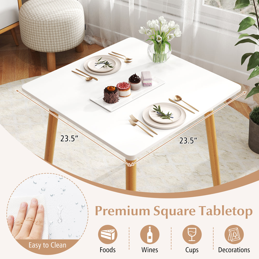 Square dining table with a 23.5" x 23.5" white waterproof surface, perfect for small spaces and easy to clean.