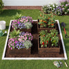 Square raised garden bed made of fir wood, featuring vibrant flowers and vegetables for a thriving garden setup.
