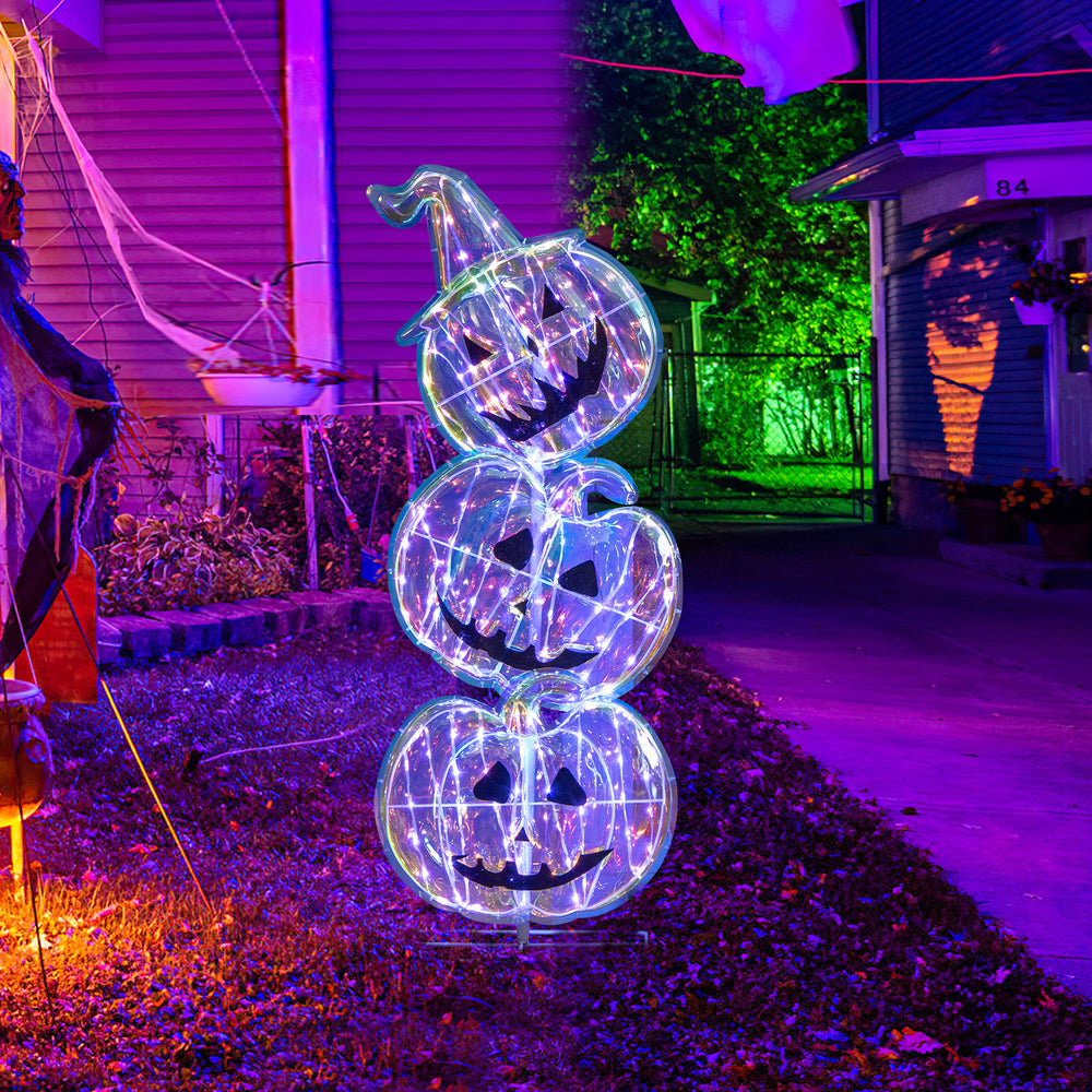 Three stacked LED lighted pumpkins with a witch hat, perfect for Halloween decoration outdoors.