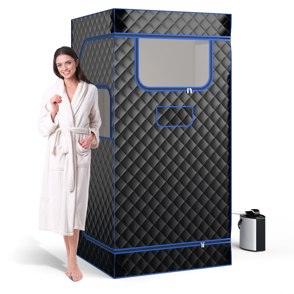 Portable steam sauna in black with remote control, featuring a 3L steam generator and foldable chair for home use.