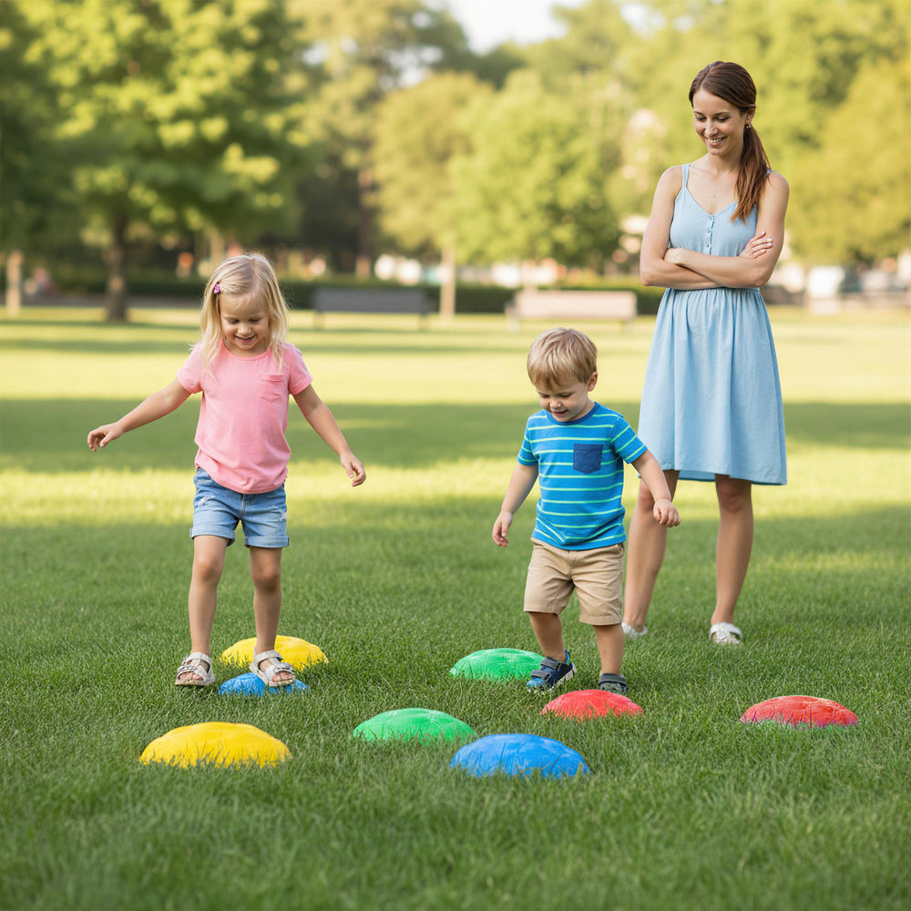 Colorful non-slip toddler stepping stones arranged on grass, promoting balance and motor skills for outdoor play.