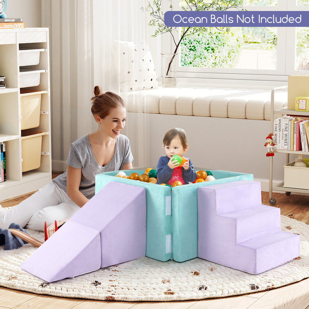 Soft play set with purple suede fabric, featuring a ball pit, ramp, and staircase for toddlers' imaginative play.