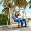 Heavy duty wooden swing frame with a family enjoying a swing on the beach, perfect for backyard relaxation.