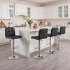 Black swivel bar stool with adjustable height and footrest, perfect for kitchen or dining room use.
