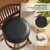 Swivel bar stool with large black PVC leather seat and curved backrest, ideal for kitchen islands and dining rooms.