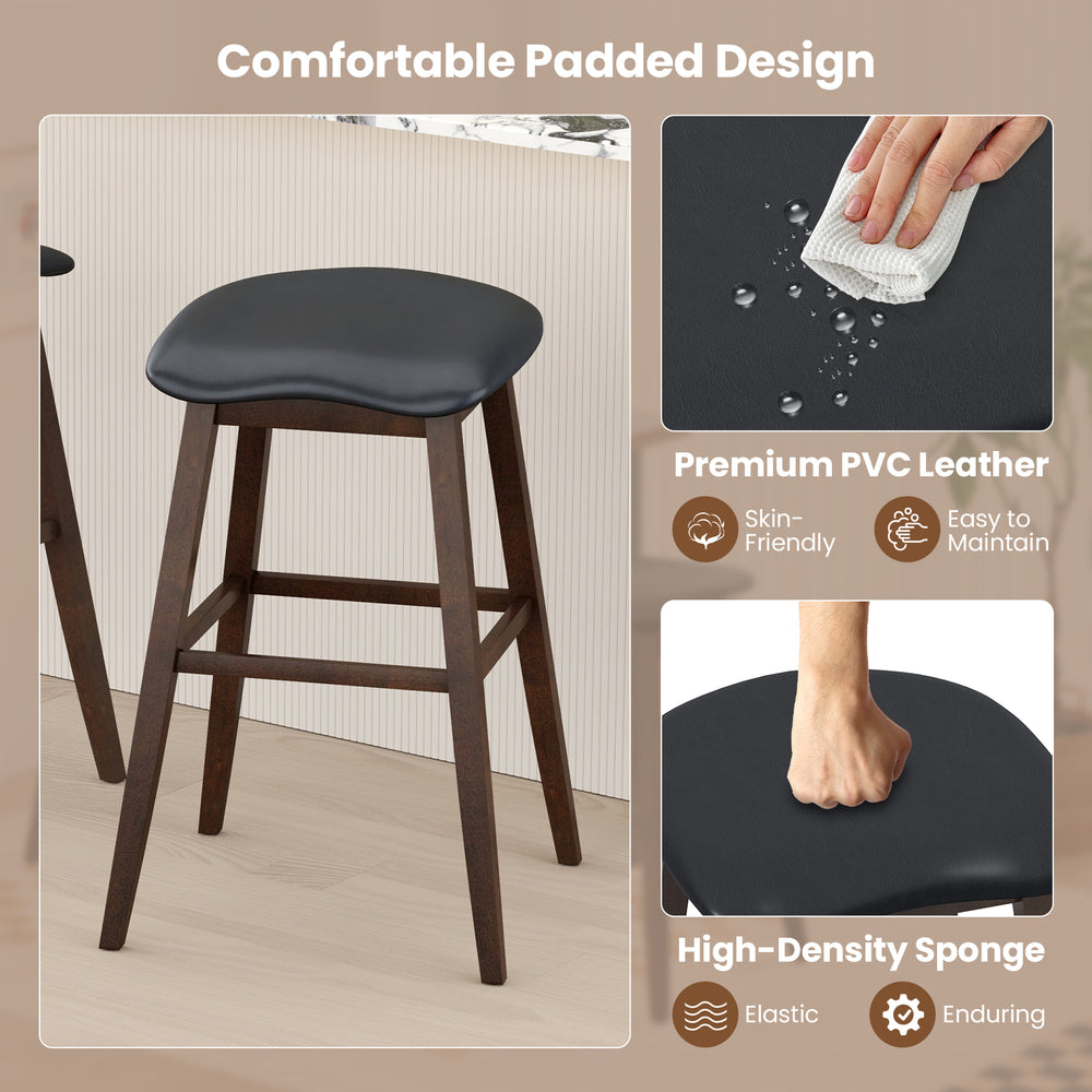 Black swivel bar stool with padded contoured seat, premium PVC leather, and rubber wood legs for kitchen or dining use.