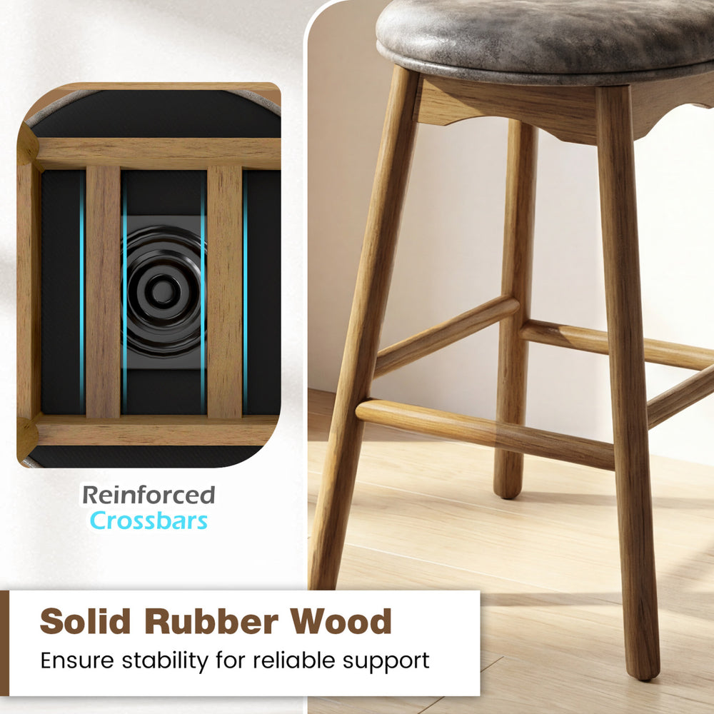 Close-up of solid rubber wood legs with reinforced crossbars for stability in swivel counter height barstools set of 2.