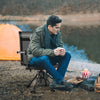 Folding swivel patio chair with adjustable legs, breathable mesh, and ergonomic support, perfect for outdoor camping.