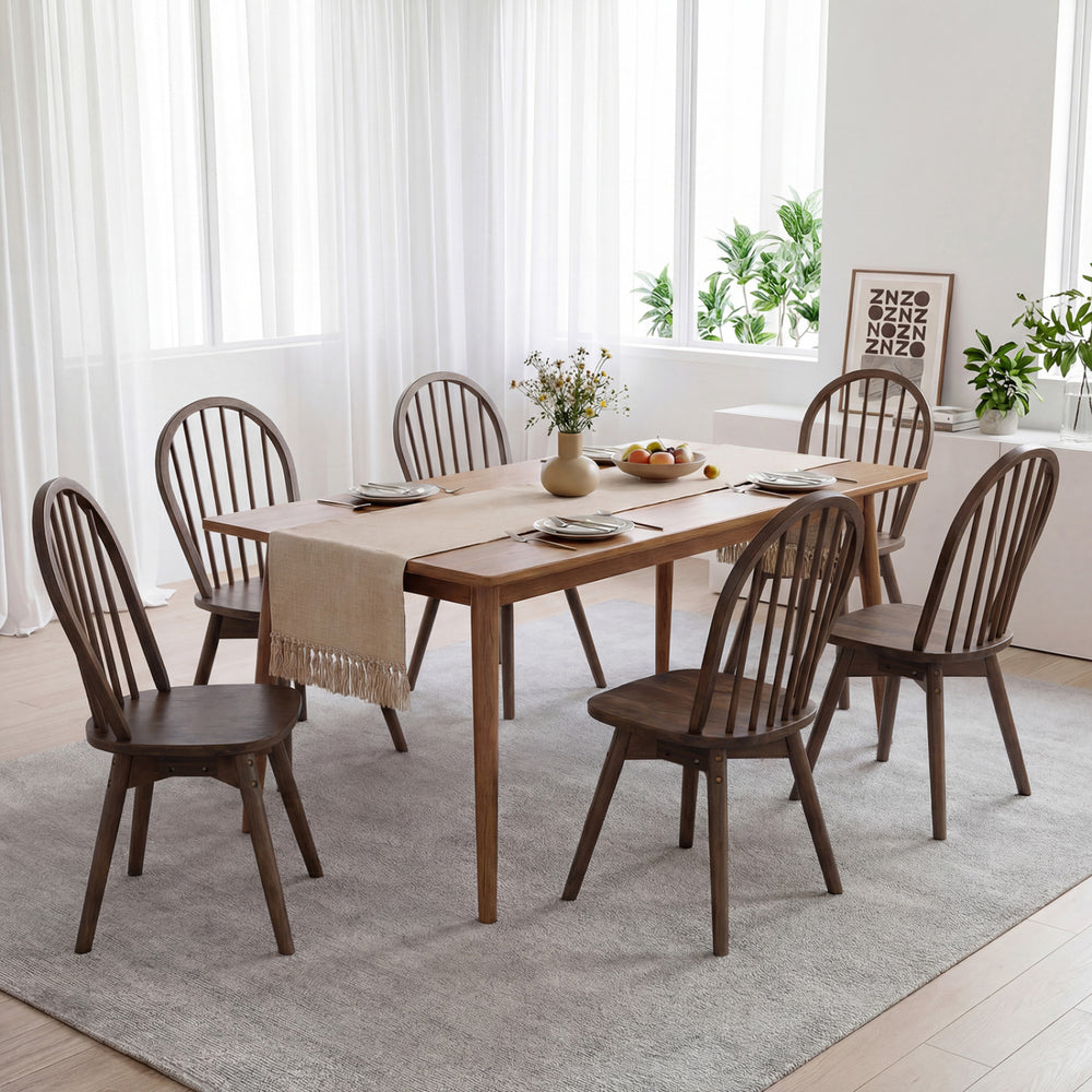 Set of 4 Swivel Windsor dining chairs in walnut with solid rubber wood frame, ideal for comfortable meals and chats.