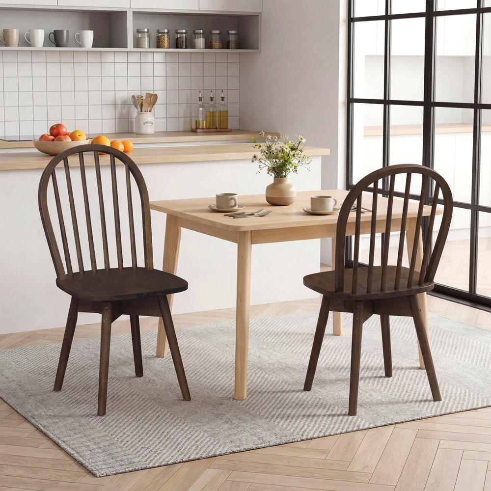 Set of 2 Swivel Windsor dining chairs in walnut with solid rubber wood frame, ideal for comfortable dining.