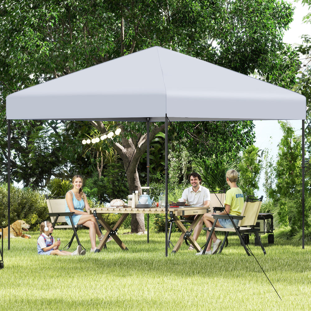 Pop-up 10x10 feet canopy tent in white, set up for outdoor dining with sturdy frame and UPF50+ sun protection.