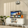Mid-century modern TV stand in white with rattan cabinets and open shelves, perfect for TVs up to 65 inches.