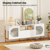 White TV stand with wavy cabinet doors, open shelves, and power outlets, ideal for showcasing decor and media equipment.