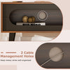 Cable management holes in the walnut TV stand for organized wires, enhancing the mid-century modern design.