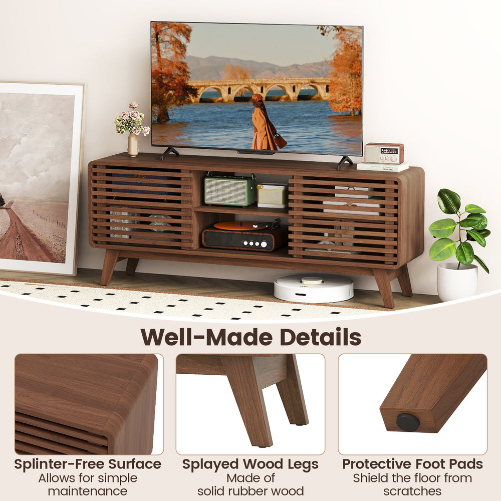 Walnut TV stand for TVs up to 65", featuring sliding doors, adjustable shelves, and splayed rubber wood legs.