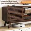 Walnut TV stand for TVs up to 65", featuring sliding doors, adjustable shelves, and mid-century design.