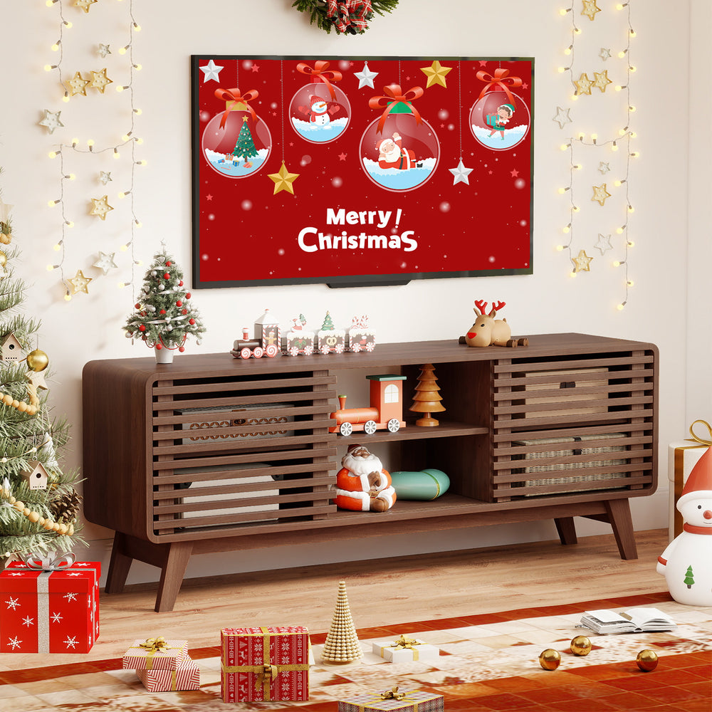 Walnut TV stand for TVs up to 65" with sliding doors, adjustable shelves, and mid-century design for living room.