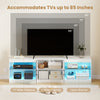 TV stand for TVs up to 85 inches with RGB LED lighting, 77" wide tabletop, and 2-door cabinet for ample storage.