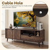 Rustic TV stand for TVs up to 65 inches featuring a cable hole, open shelves, and a large drawer for organized storage.