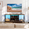 TV stand with LED lights, brown finish, designed for 65-inch TVs, featuring open compartments and a sturdy metal frame.